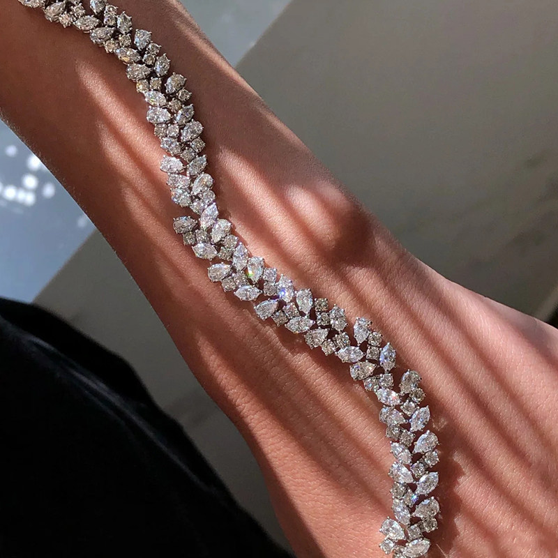 Alternating Pear & Marquise & Round Mixed Fancy Cut Full Pave Lab Diamond Linear Bracelet lay on arm