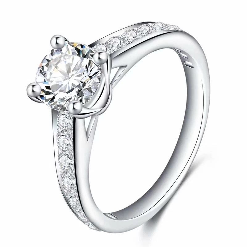 Round Cut Solitaire 4 Prong Ring With Half Channel Pave Shank in White Gold side view