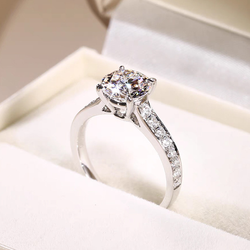 4 Prong Sparkling Round Cut Man Made Diamond Ring With Half Channel Pave Shank