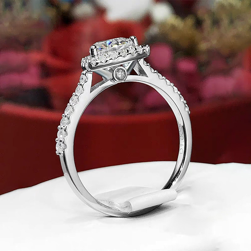 Single Round Cut Staggered Cushion Halo Diamond Ring With Half Eternity Polished Shank side view